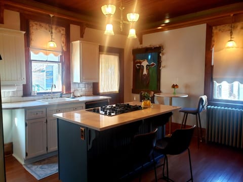 Kitchen with seating at the bar