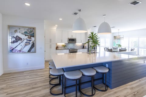 2nd fl spacious kitchen island w/ seating for 6. 