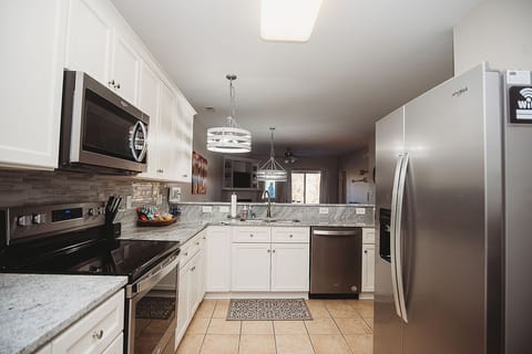 Recently updated fully equipped kitchen with stainless appliances.