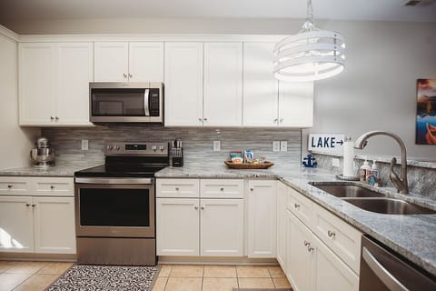 Recently updated fully equipped kitchen with stainless appliances.