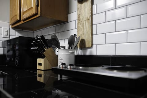 A microwave and hot plate with microwave oven (not pictured)