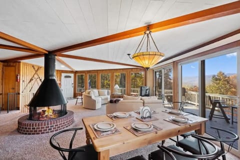 The living space from where you will be able to enjoy the mountain view with a 360 degree fireplace