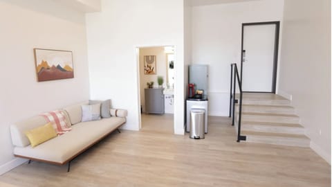 Sofa in office that could also be used as twin bed (sheets and pillows provided)