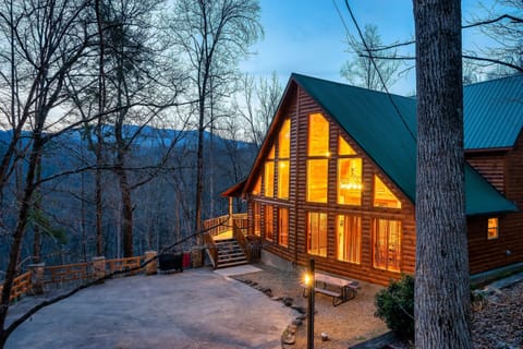Cabin at night, parking area