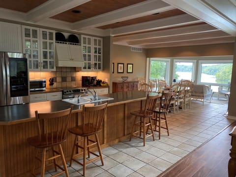 Kitchen, dining, then sunroom