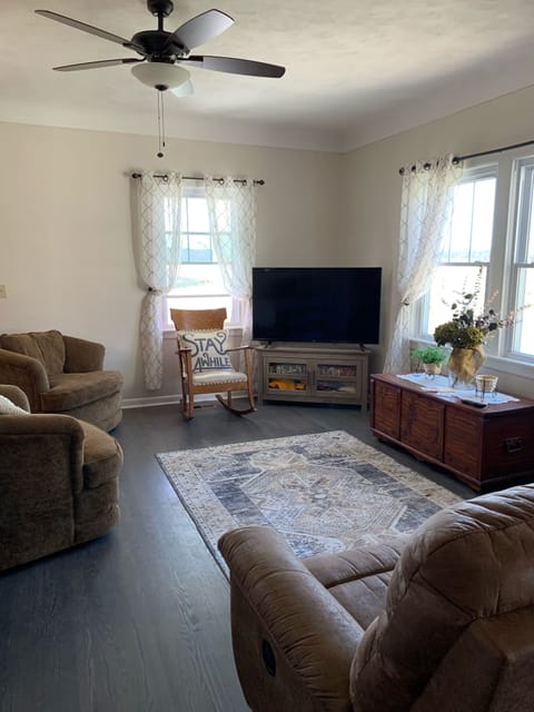 Living room with smart TV and Hulu channels