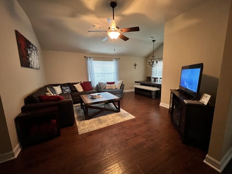 Living Room - we have board games, puzzles, and books, and a 50 inch Roku TV