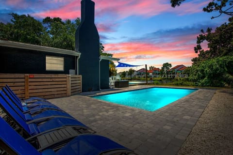 Step into Poseidon`s Palace, where twilight casts a magical glow over our pool area, offering a breathtaking view of the lagoon.