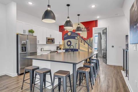 Kitchen with generous space and a central island accommodating 7.