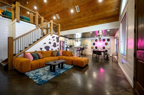 The open floor plan seamlessly connects the living room to the dining area and kitchen, making it easy to gather, entertain, and enjoy every moment together.