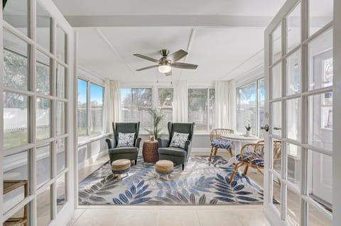 Sunroom with seating and a TV!