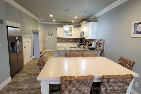 Full dining table and breakfast bar