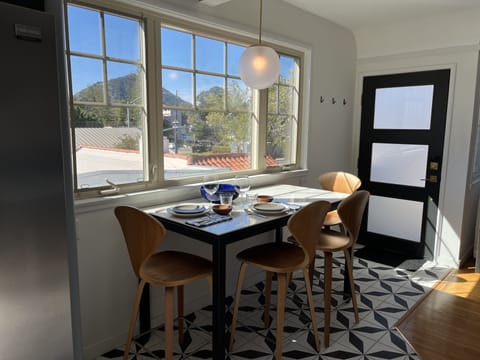 View of San Luis Mountain from dining table.  Kitchen is well stocked