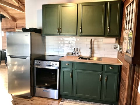 Brand new kitchen - from appliances to dishes.