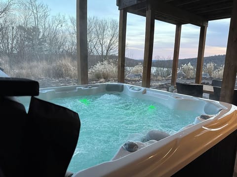 House 2 • Downstairs Patio • 7 Person Hot Tub • Overlooking Boulder Lake • Lake Views in Winter • Mountain Views in Summer