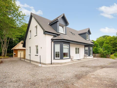 Plant, Furniture, Property, Window, Chair, Building, Wood, Lighting, Flowerpot, Architecture