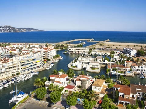 Water, Sky, Daytime, Azure, Building, Coastal And Oceanic Landforms, Body Of Water, Landscape, Beach, Natural Landscape
