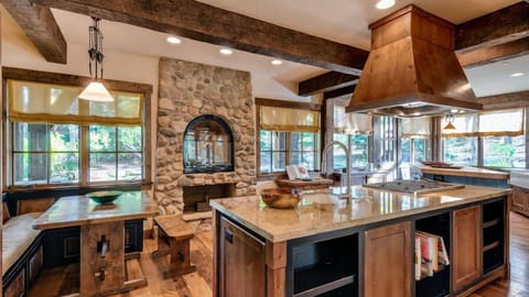 Gourmet kitchen with two breakfast nooks, gas fireplace
