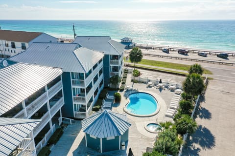 This idyllic Summer Breeze Miramar Beach Florida condo is directly across the street from the Gulf of America. The warm breezes from the nearby Gulf add to the natural beauty and serenity of this wonderful place. Sunrises and sunsets are unbelievable!