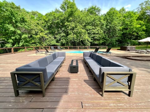 Comfortable, modern couch set with a propane fire pit.