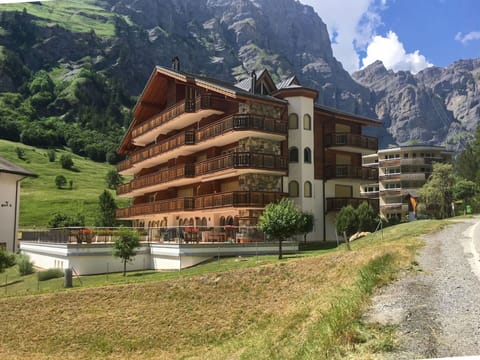 Plant, Building, Mountain, Property, Sky, Cloud, Nature, Natural Landscape, Tree, Architecture