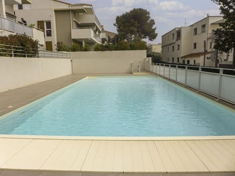 Water, Building, Swimming Pool, Property, Plant, Window, Sky, Azure, Cloud, Tree
