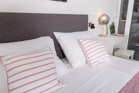 Bedroom with queen size bed. 