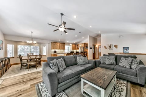 The living, dining, and kitchen areas all flow together seamlessly.