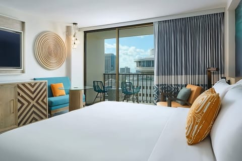 Wake up to skyline views and unwind on your balcony.