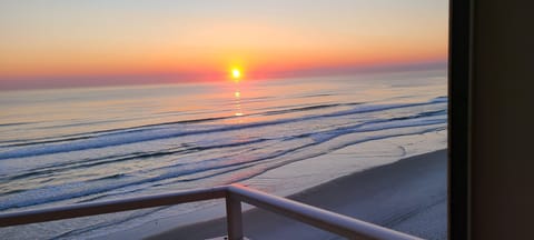 Breath-taking sunrise from the master bedroom, dining room, kitchen and den.