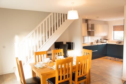 Dining space and modern kitchen