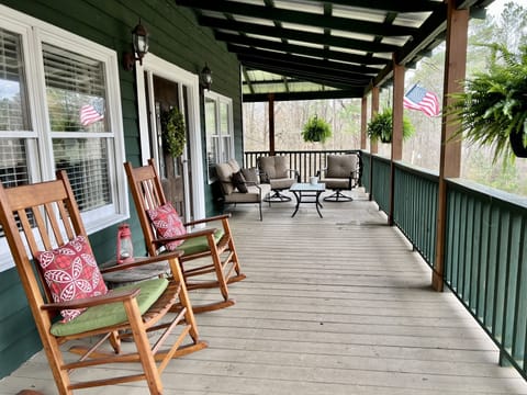 Large, wrap around front porch with seating.