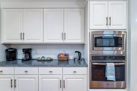 Coffee & Wine Bar: Drip Coffee, Keurig, and Tea area with a microwave and oven.