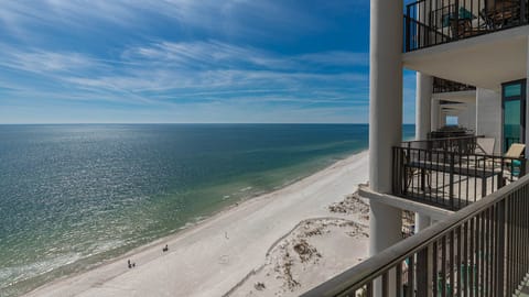 Enjoy stunning beachfront views from the balcony, perfect for relaxing while sipping morning coffee