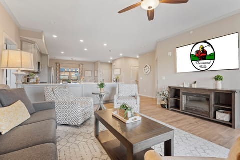 Beautifly Furnished Living Room with Cable TV, Sunroom, and Deck Access