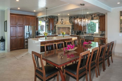 Custom mahogany dining table for 12! & 6 more at massive kitchen Island.
