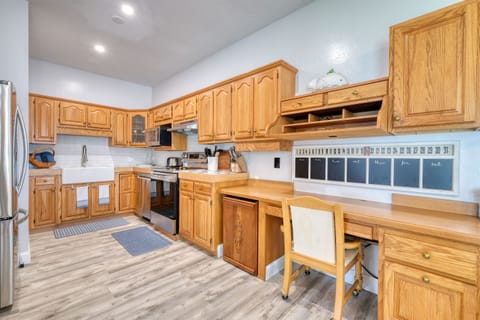 The spacious, bright kitchen is fully stocked for your gourmet meal preparation!