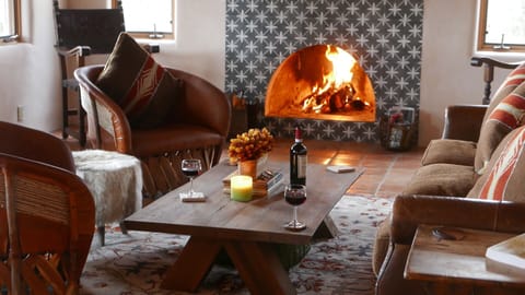 LIVING ROOM: WBFP/ample seating/SmartTV/game table for checkers and backgammon.