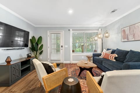 Modern beach-inspired living room with 60" smart TV equipped with Fire TV