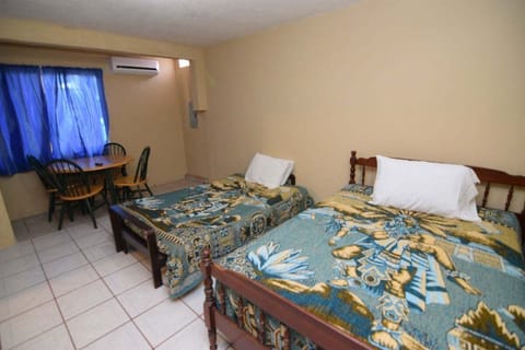 Cozy studio located approximately 2 miles north of the San Felipe Malecon . Features secured parking, A/C, free WiFi, and an on-site manager for all your needs .