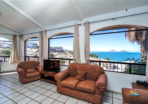 Relax in the comfortable living room at Casa Julieta in San Felipe — perfect for group downtime.