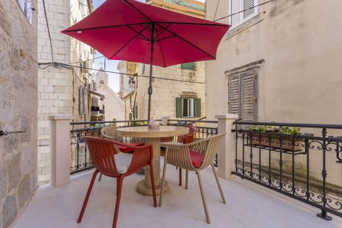 Balcony with sitting area.