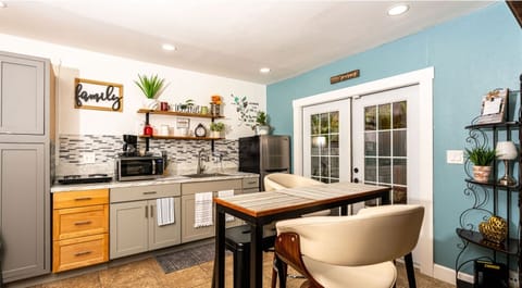 Kitchen / Dining Area with a four burner stove top plate/fully stocked