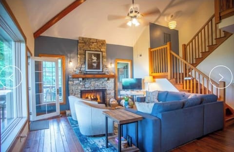 Cozy living area with beautiful views, access to the deck and gas fireplace