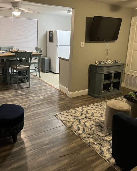 Living room with smart TV and queen sofa