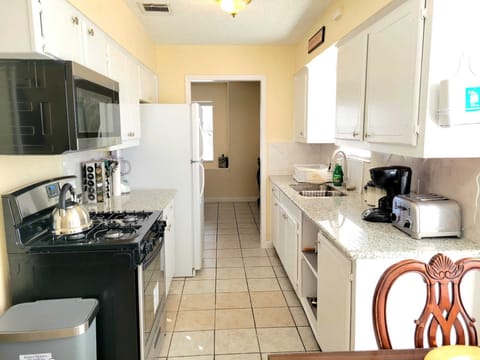 walk in kitchen equipped with essentials