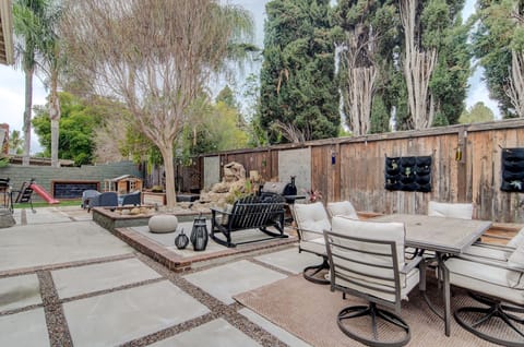 Backyard Oasis with ample seating to relax and unwind after a long day. 