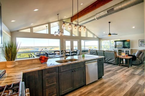 10 ft windows give an unobstructed view from anywhere in the main living space