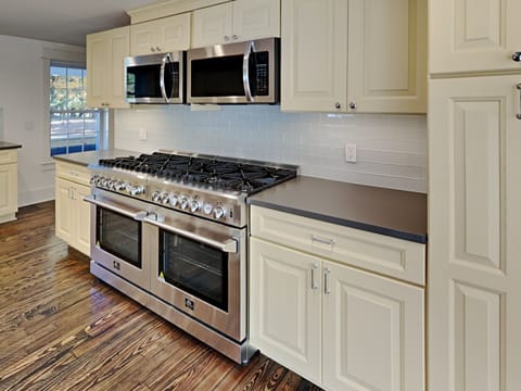 Kitchen with 2 Ranges, 2 Micros, 2 Dishwashers & 2 Refrigerators