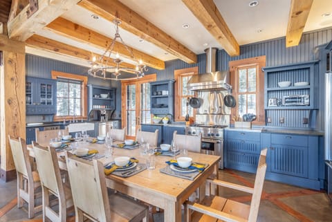 Overlooking the living room is the newly remodeled Gourmet kitchen with stainless steel appliances, 4 burner gas stove with griddle and natural stone counter tops.